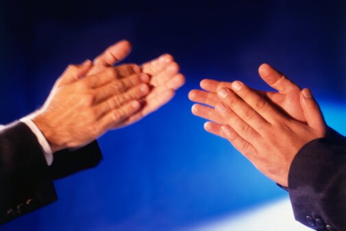 Clapping hands symbolizing recognition of people who have made significant contributions to the Fabry disease community